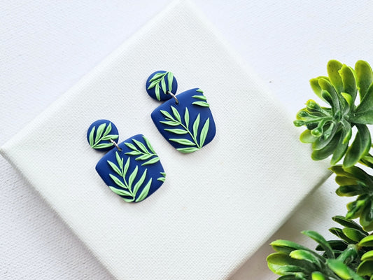 Blue Earrings with Green Leaf, Polymer Clay Earrings, Nature, Plant Earrings - Studio Niani